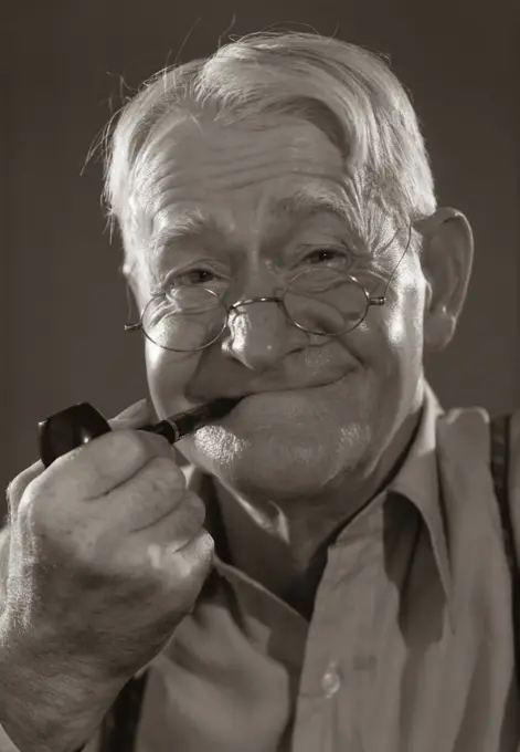 1930S 1940S Smiling Character Elderly Man Smoking Pipe