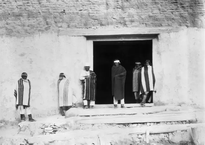 1890s GROUP OF NATIVE AMERICAN INDIAN MEN GOVERNOR EUSEBIUS & STAFF LOOKING AT CAMERA ACOMA PUEBLO CIBOLA COUNTY NEW MEXICO USA