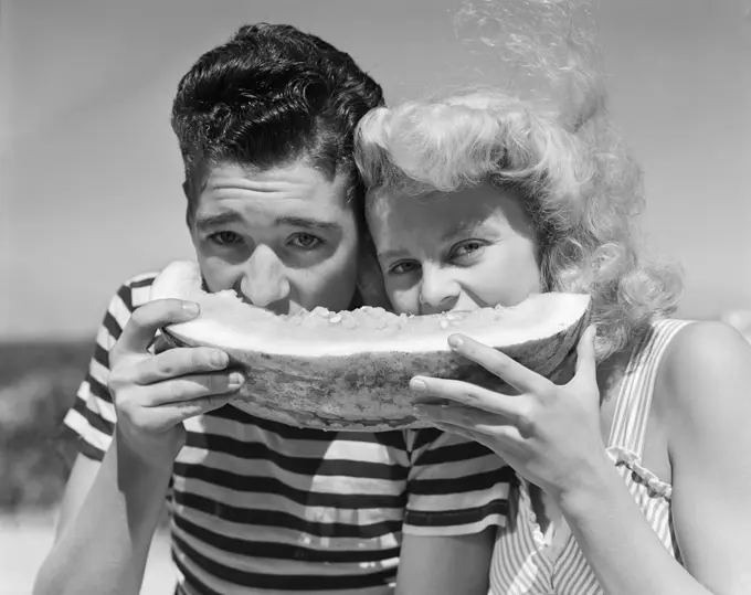 1940S 1950S Teen Age Boy & Girl Eating Slice Watermelon