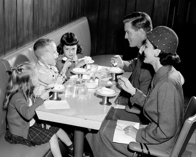 1950S 1960S Family Of 5 Eating Ice Cream In Restaurant