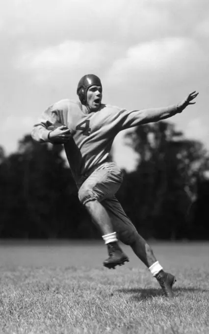 1930S Football Player Running With Ball