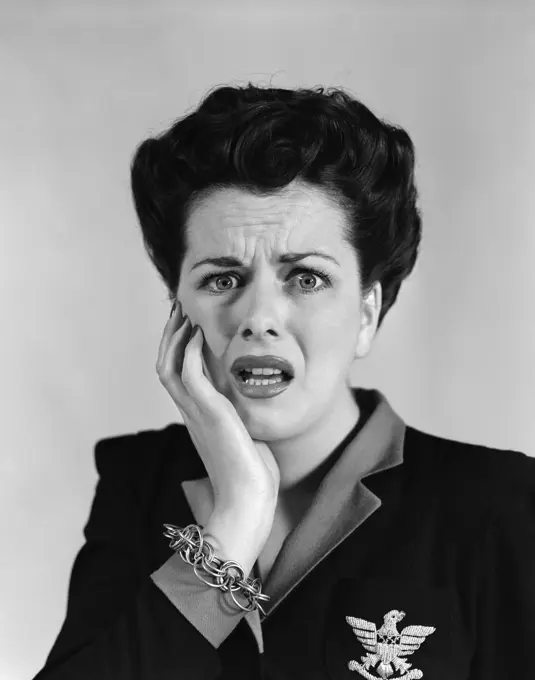 1940S Portrait Of Woman With Shocked Expression Looking At Camera