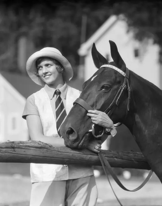 1930S Woman In Hat Smiling Looking Aside Wearing Striped Tie Holding Reins And Horses Head Snaffle Hunter Bridle