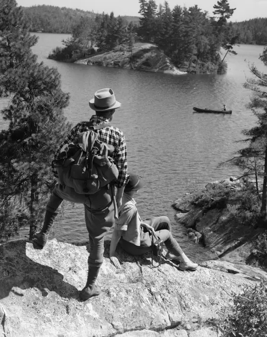 1930S Couple Hiking Together Looking At Canoe Lake Of The Woods Ontario Canada