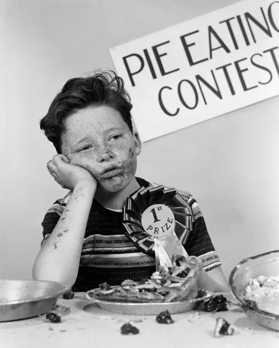 1950S Boy Wins 1St Prize At Pie-Eating Contest