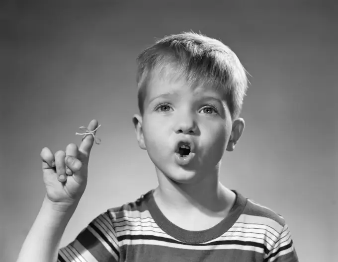 1950S Boy Funny Facial Expression Blond String Tied To Finger To Remember Not To Forget