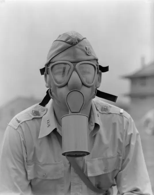 1942 Man Soldier Army Lieutenant Wearing A Gas Mask