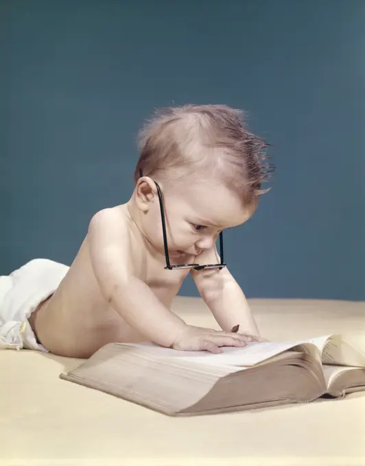 1960S Funny Baby Wearing Oversized Glasses Reading Big Book