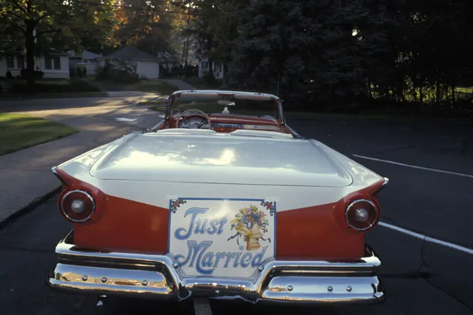 1950S Just Married Sign On Back Of Ford Convertible Car