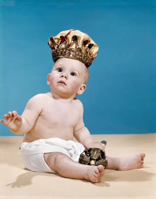 1960S Baby Wearing Cloth Diaper  And Crown Holding A Scepter