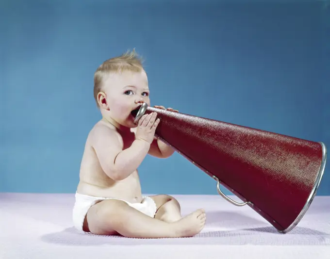 1960S Baby Holding Speaking Into A Large Megaphone