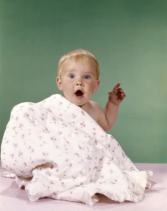 1960S Baby Partially Covered By Printed Blanket