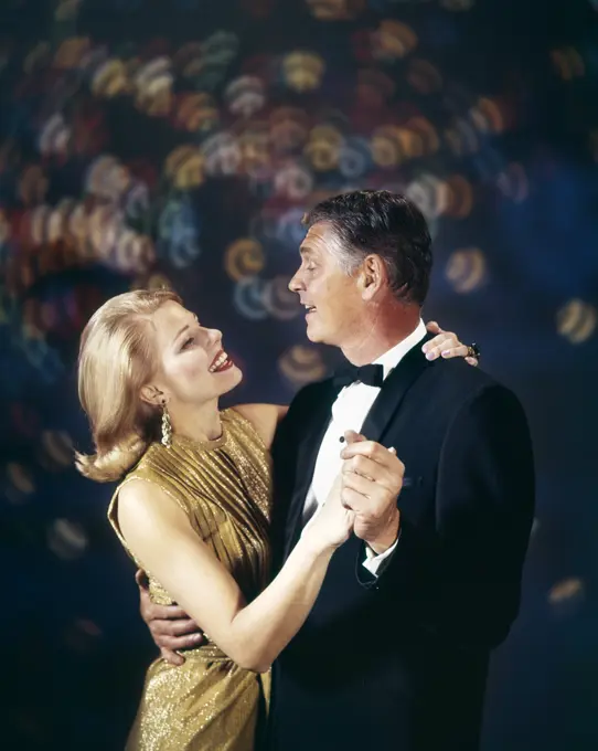 1960S Couple In Formal Clothes Dancing Multiple Light Background Celebration Anniversary Man Woman