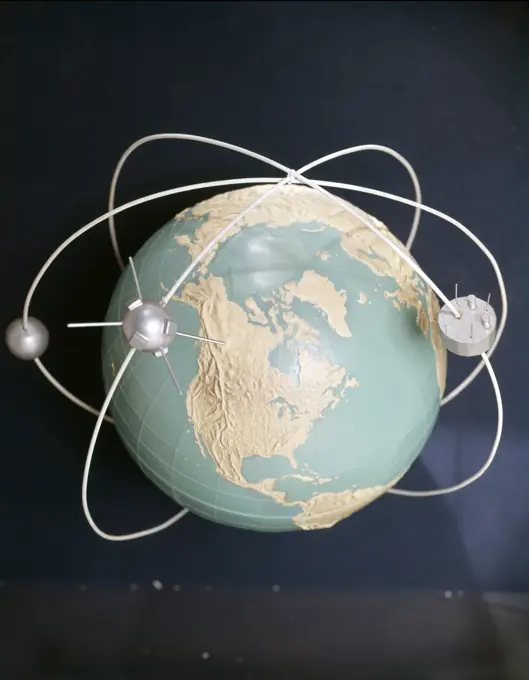 1950s 1960s MODEL OF SATELLITES ORBITING THE GLOBE