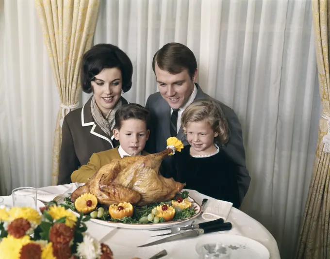 1960S 1970S Family Portrait With Holiday Roasted Turkey On Dining Table