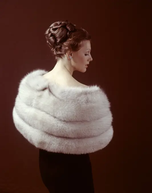 1970S Woman From Back Wear Light Color Fur Stole Around Her Shoulders  