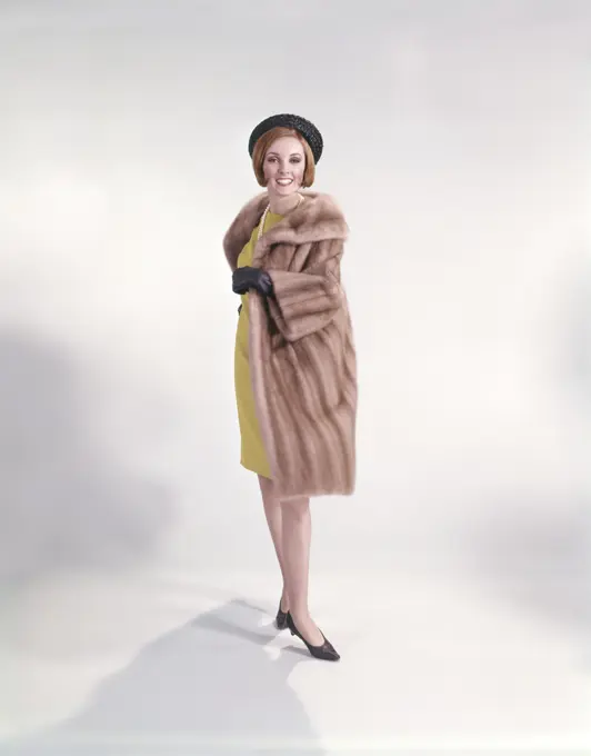 1960S Woman In Yellow Dress Black Hat Gloves Shoes Pearl Necklace Fur Coat