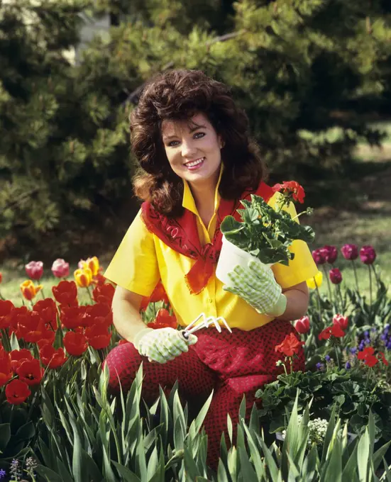 1980S 1990S Smiling Brunette Young Woman Gardening 