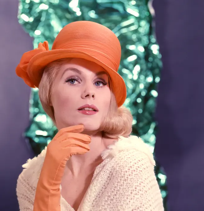 1960S Portrait Glamorous Blond Woman Orange Hat And Gloves High Fashion Style Clothes