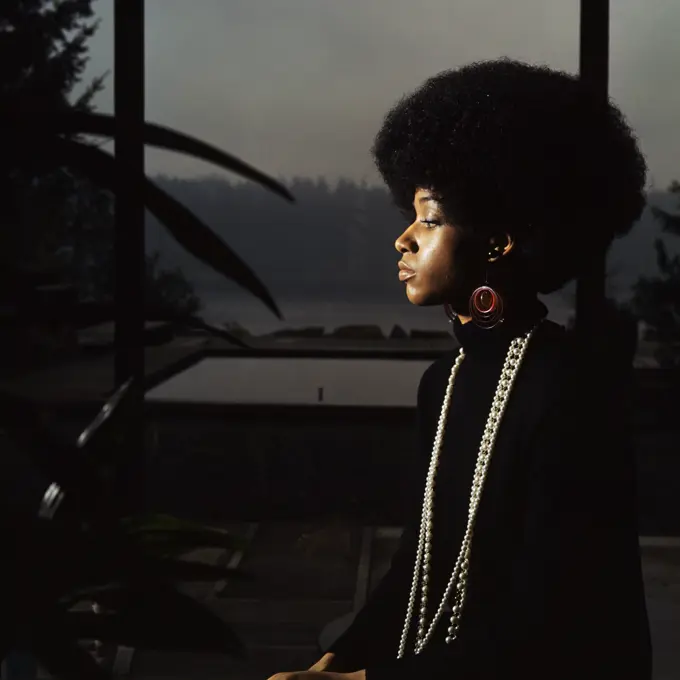 1960S 1970S Serious Moody Profile Portrait African American Woman With Afro Hair Style Earrings Pearl Bead Necklace Fashion