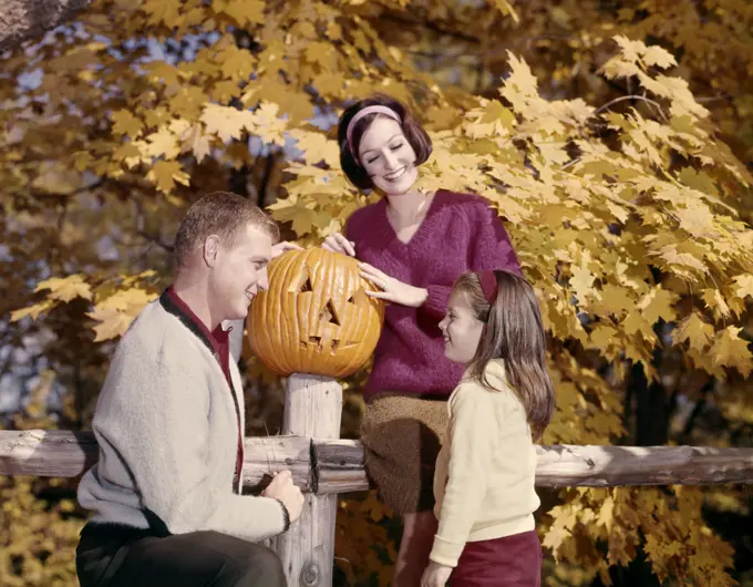 1960S Jack-O'-Lantern Pumpkin Family Mother Father Daughter Girl Fence Autumn Fall