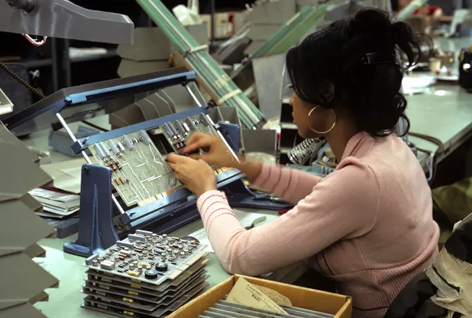 1970S Woman Assembling Computer