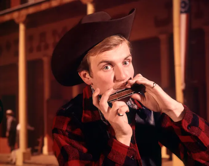 1960S 1970S Man Cowboy Hat Playing Harmonica