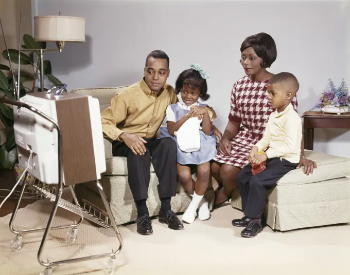 1960S Family African American Family Father Mother Son Daughter In Living Room Watching Portable Television Tv Set