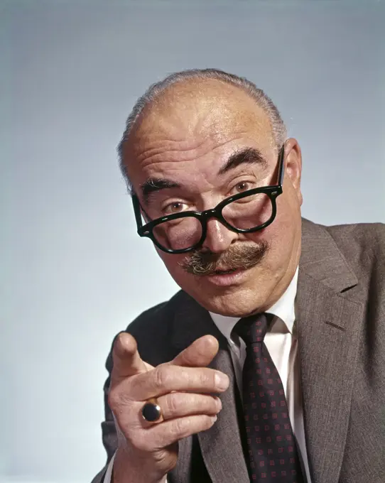 1960S Balding Elderly Man Eyeglasses Moustache Pointing Finger