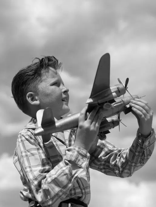 1930S 1940S 1950S Profile Freckle-Faced Boy Holding Model Propeller Airplane