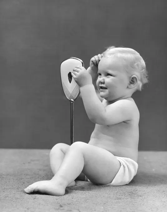 1940S 1950S Baby Holding Mirror Looking At Hair