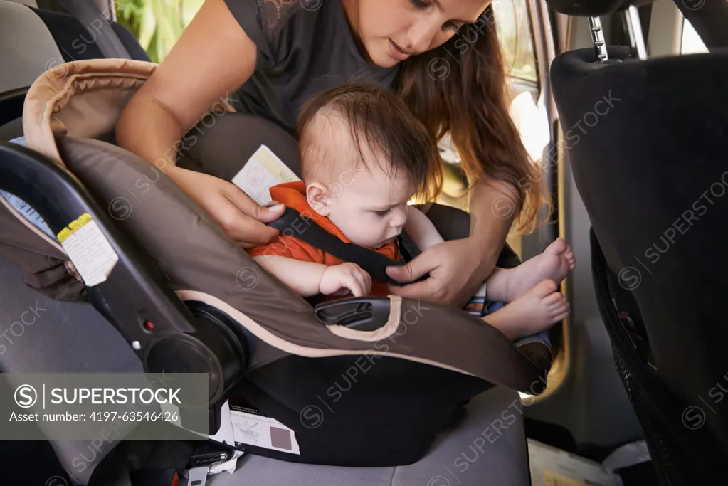 Mom, baby and car seat in motor vehicle for child safety with buckle or strap. Mother, infant and protection, travel and parenting for secure transport to fasten or latch with love and harness