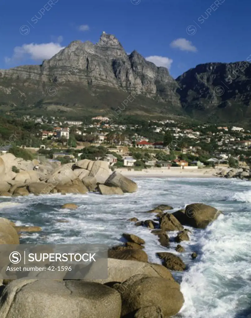 River flowing near a town with mountains in the background, Camps Bay, Cape Town, South Africa