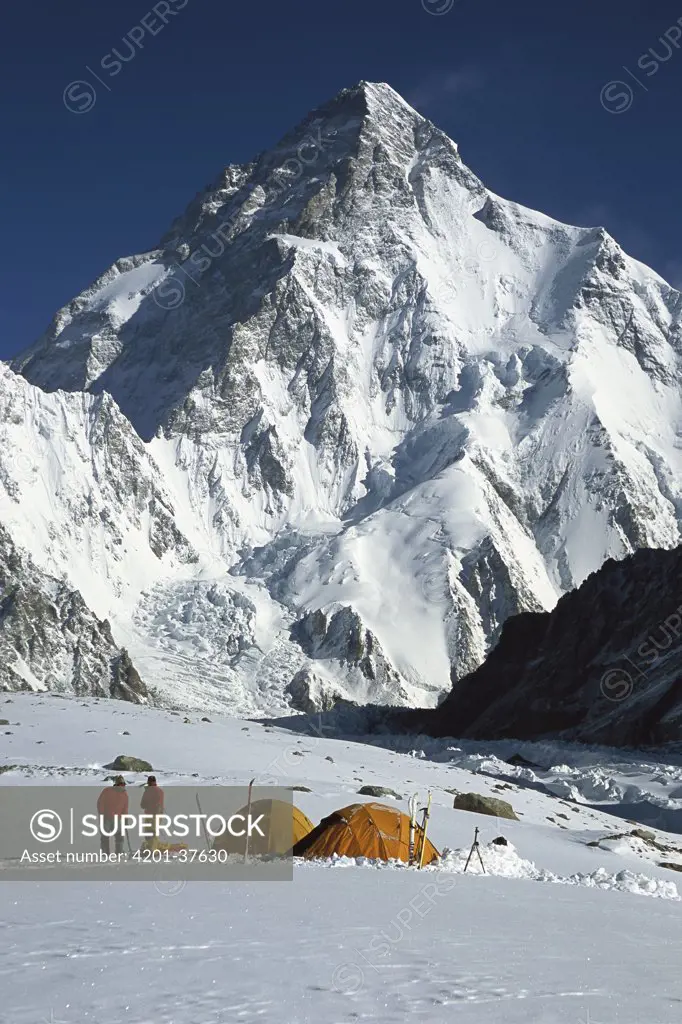 Campsite under K2, second highest peak in the world, on the Godwin Austen Glacier, Karakoram Mountains, Pakistan
