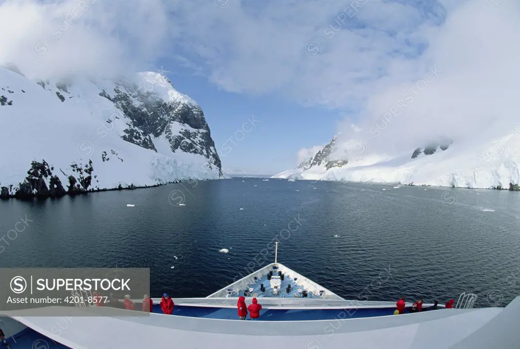 Ship with tourists in Lemaire Channel, Antarctica