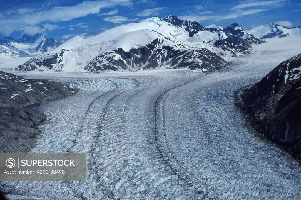 Glacier showing lateral and medial moraines in glacial valley, Alaska