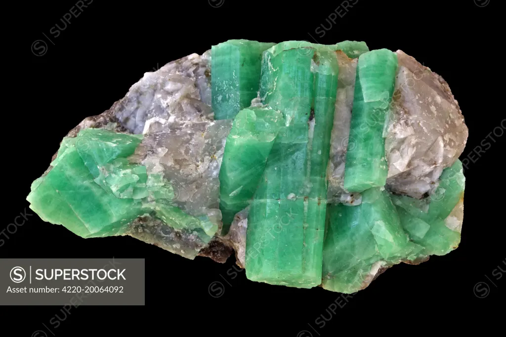 Emerald - Green variety of Beryl - Be3Al2Si6O18 . China. Berylium aluminum silicate - green clor from trace of chromium - Important gem.