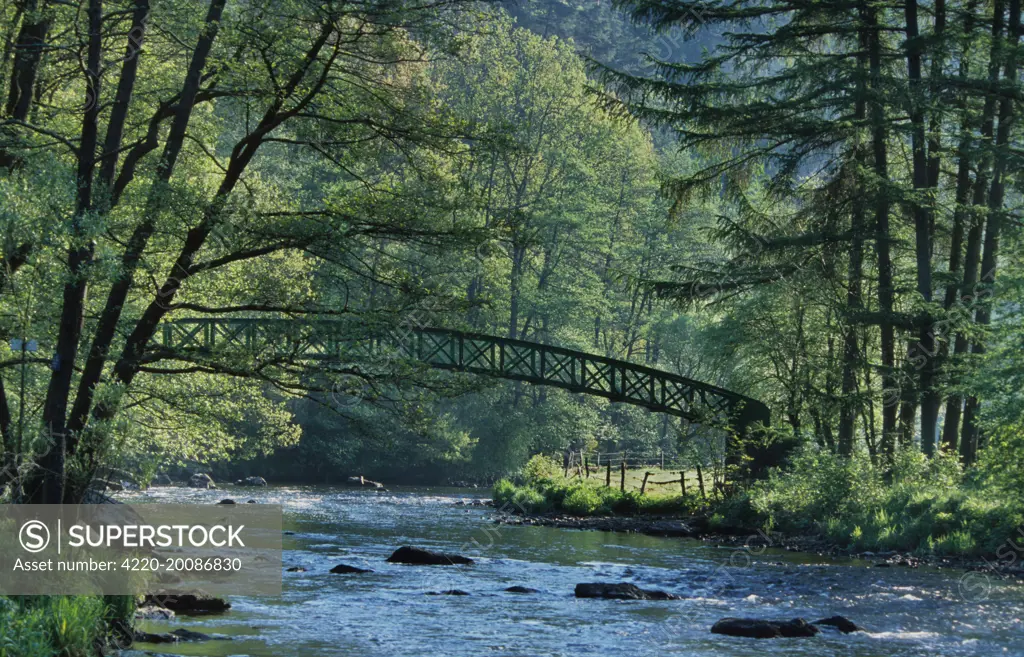 River l'Ambleve with footpath bridge. Stavelot, Ardens, Belgium.