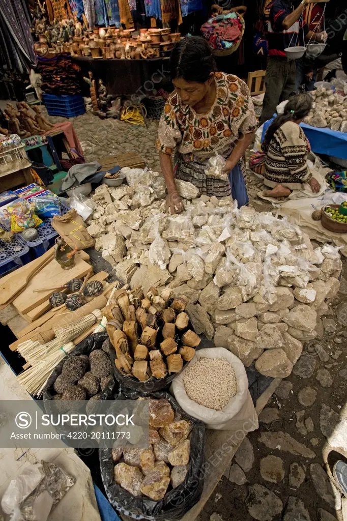 Guatemala - Chichicastenango Market - woman selling chalk 