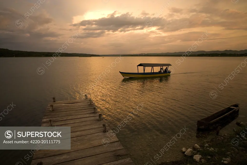 Guatemala - Flores Lake &amp; pontoon at sunset 