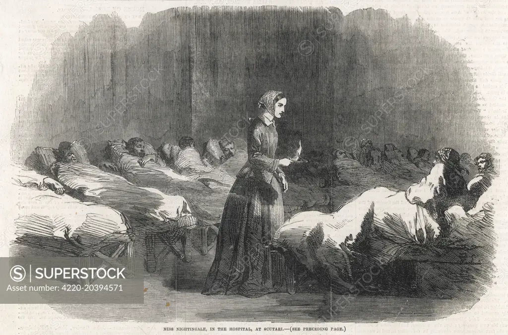 In Scutari, Florence  Nightingale attends a patient during the night round.       Date: 1855