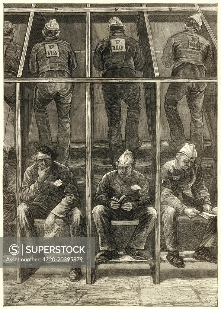 Inmates at the Clerkenwell  House of Correction in the  booths by the treadmill.   Inmates would alternate for 15  shifts; 15 minutes on  following by a 15 minute rest.      Date: 1874