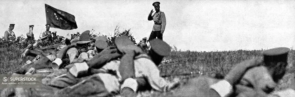 Photograph showing Tsar Nicholas II saluting troops during army manouevres.  Russia was traditionally seen as the protector of the Slavs and after Austria attacked Hungary in 1914 mobilised troops.  The first line of defence of the Russian army was estimated to number 1.8 million at the time with 5 million fighting men in reserve.     Date: August 8th 1914