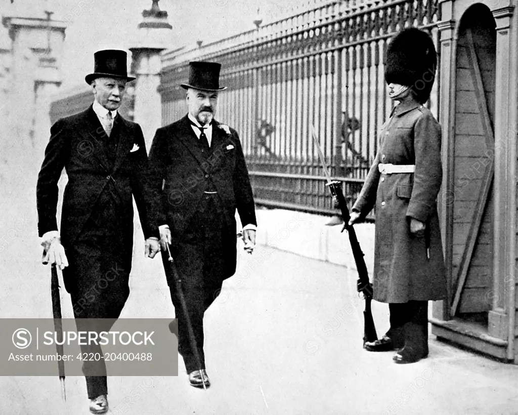 Photograph showing Colonel Sir William Waldron and Lt.-Colonel Sir John Laurie, the two retiring Sheriffs of the City of London, leaving Buckingham Palace after being knighted, London, 1936.  1936