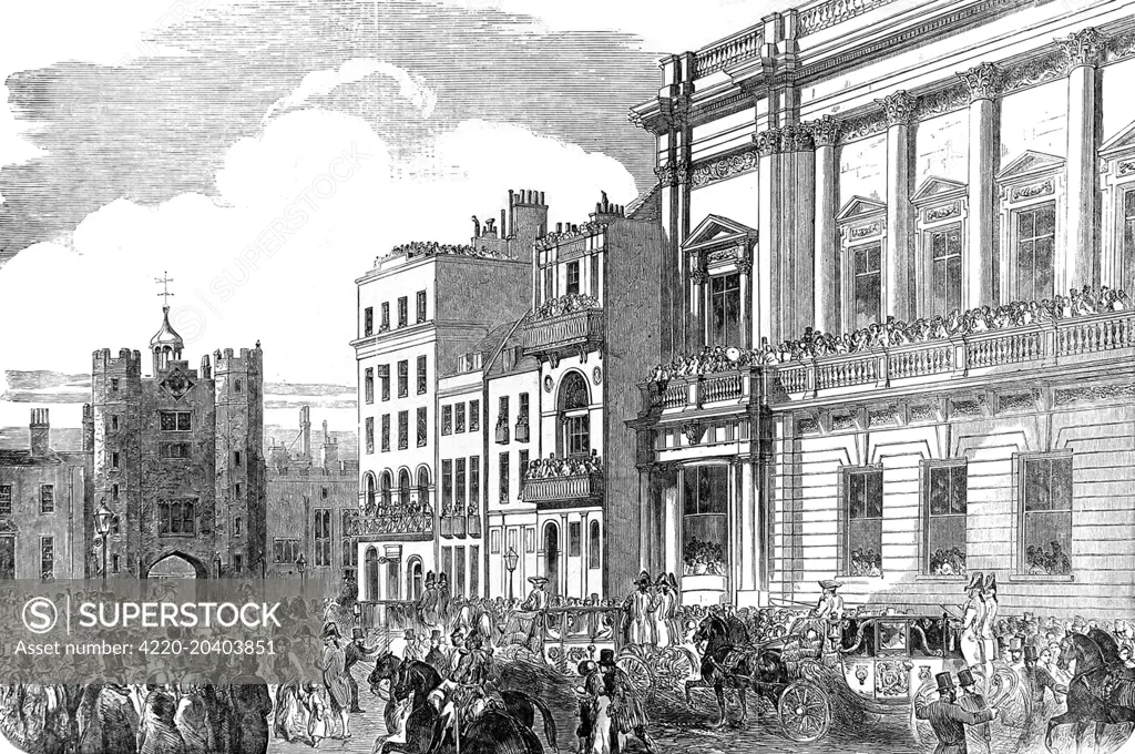 Engraving showing Queen Victoria arriving, by carriage, at St. James's Palace (gatehouse on left), June 1853.      A large number of people are shown lining St. James Street to acclaim their monarch.     Date: 4 June 1853