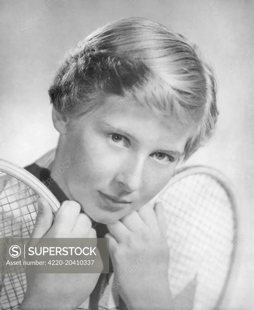 Christine Truman Janes (born 1941), British tennis player pictured in The Tatler as a promising 15 year old.  She was beaten in an all-British ladies' Wimbledon final in 1961 by Angela Mortimer but has had a successful career since as a coach and commentator.     Date: 1956