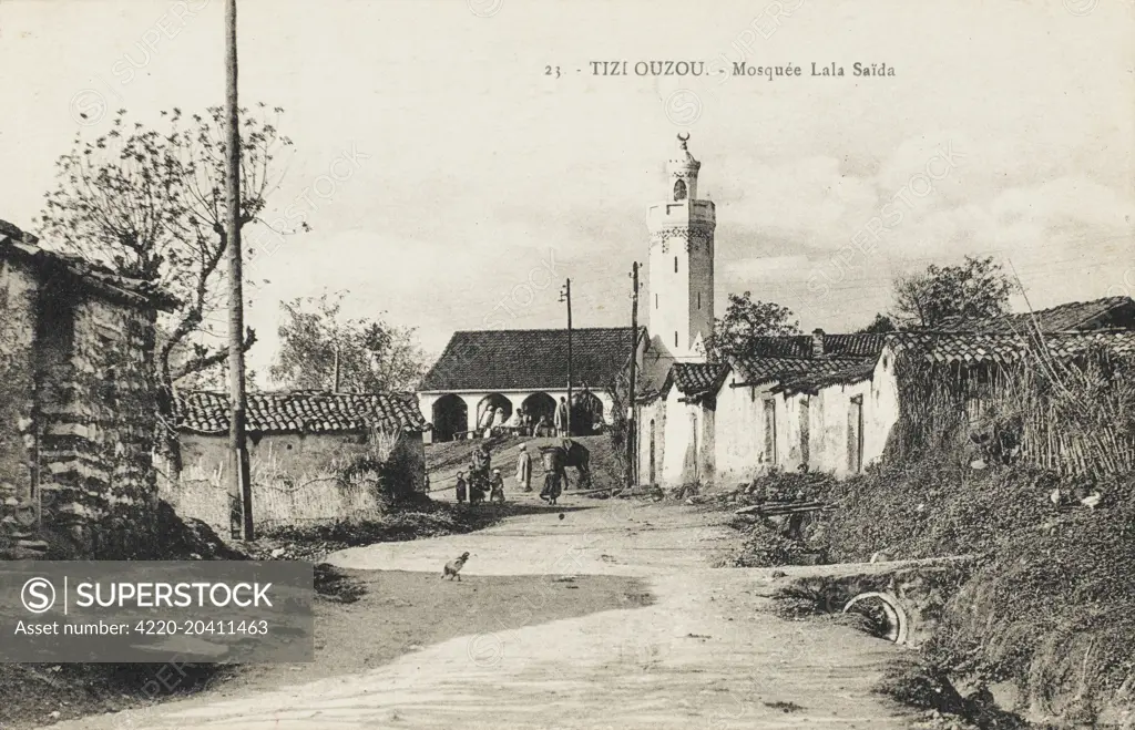 Tizi Ouzou is a city in Kabylia, Algeria - the capital and largest city of Tizi Ouzou Province and of Great Kabylia (western part of Kabylia), Algeria. The Mosque Layla (Laila) Saida can be seen in the distance.     Date: circa 1910s