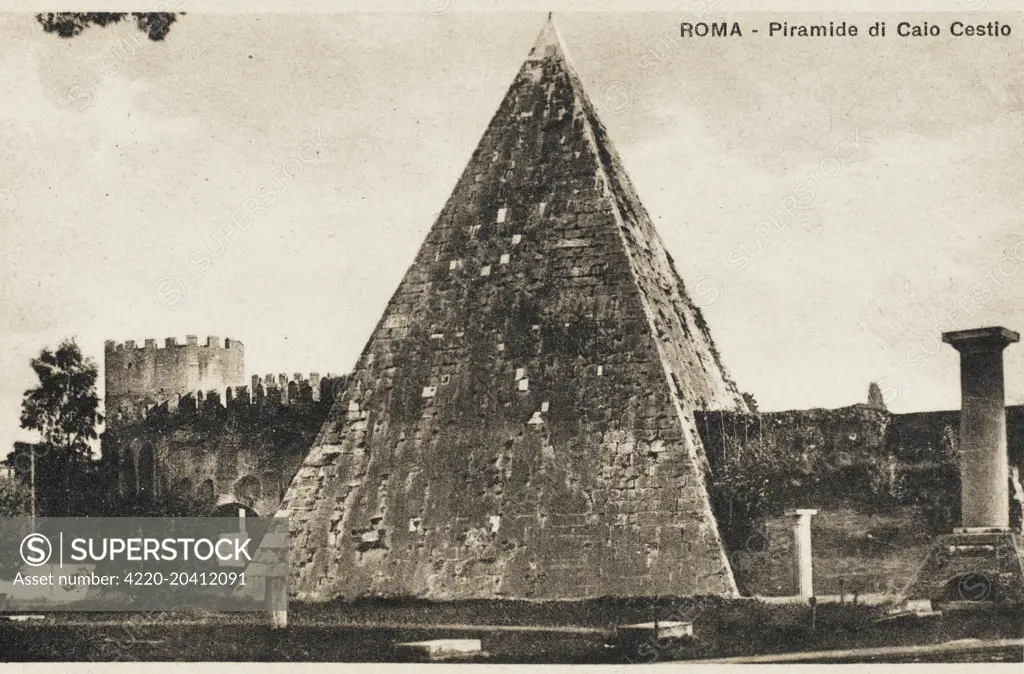 The pyramid was built about 18 BC-12 BC as a tomb for Gaius Cestius Epulo, a magistrate and member of one of the four great religious corporations at Rome, the Septemviri Epulonum. It is of brick-faced concrete covered with slabs of white marble standing on a travertine foundation, measuring 100 Roman feet (22 m) square at the base and standing 125 Roman feet (27 m) high. In the interior is the burial chamber, a simple barrel-vaulted rectangular cavity measuring 5.95 metres long, 4.10 wide and 4