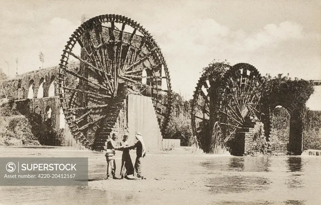 Antioch - Antakya (Turkish) - on the Orontes River in the far south of modern Turkey. One of the large waterwheels for which Antioch is famed.       Date: circa 1910s