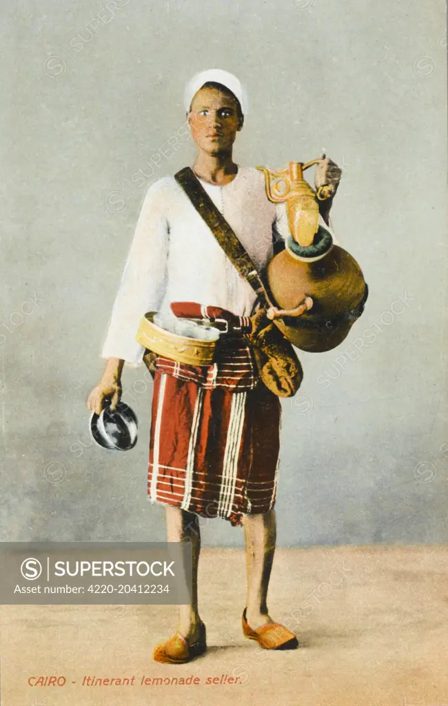 Egyptian Lemonade Seller with a shoulder strap ewer - Cairo.      Date: 1910s